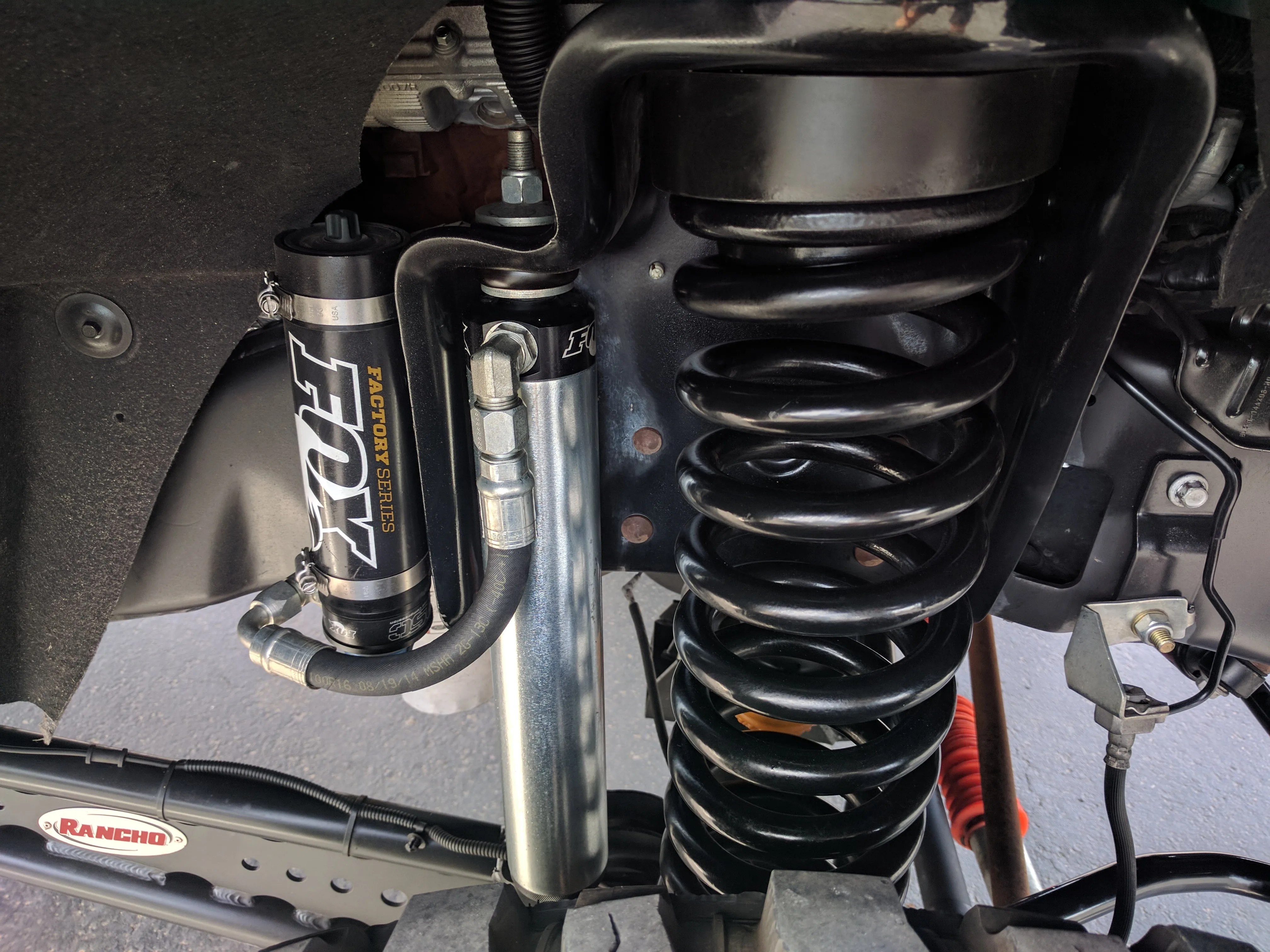 Fox 2.5 Factory Series Reservoir Shocks Front Pair for 2006-2008 Dodge Ram 1500 4WD Extended Cab